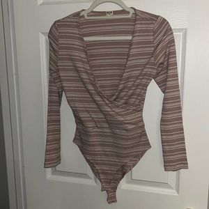 Pink stripped body suit